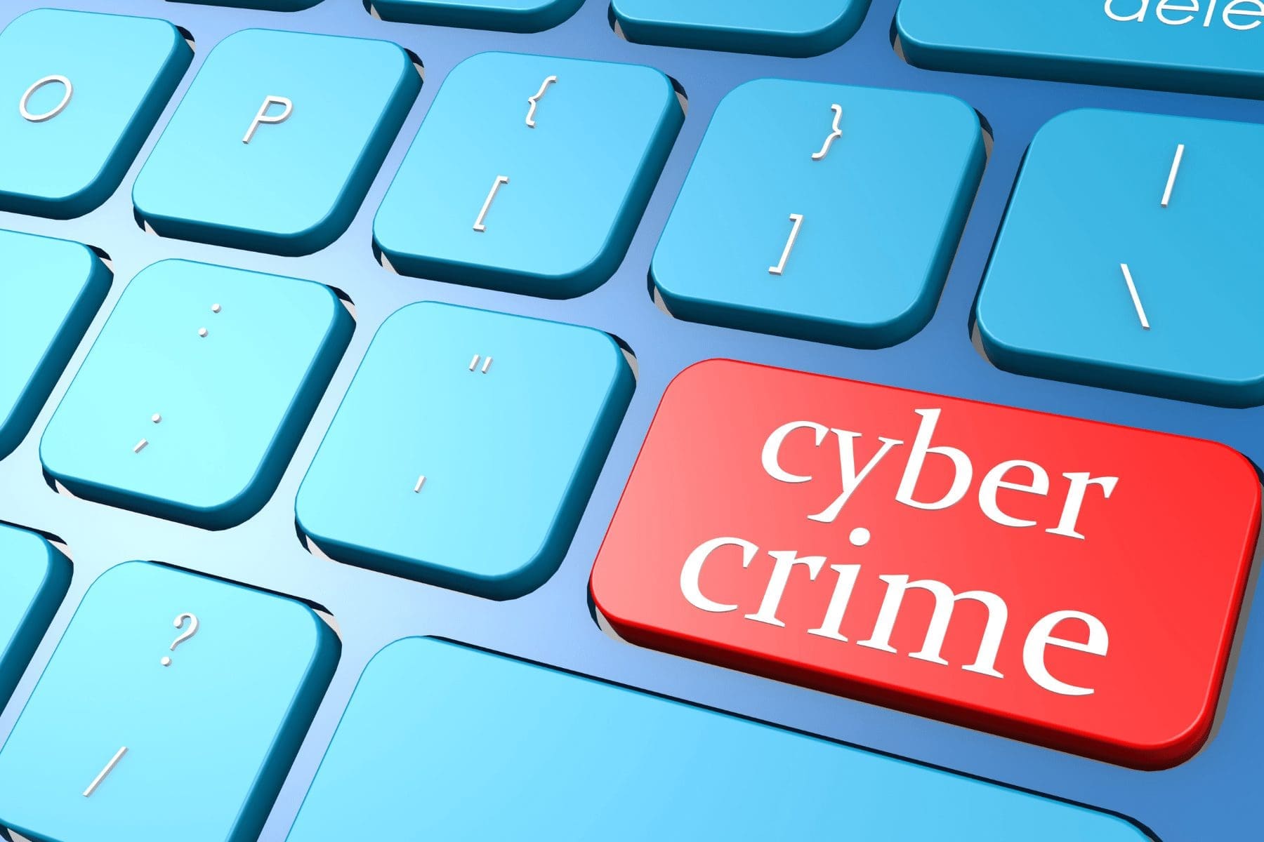 a keyboard with a cyber crime key